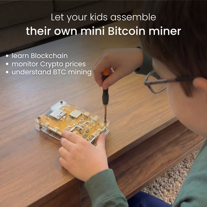 Child assembling a mini Bitcoin miner 
